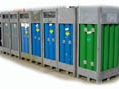 MEGC 2  Lossen pakketten met cylinders.